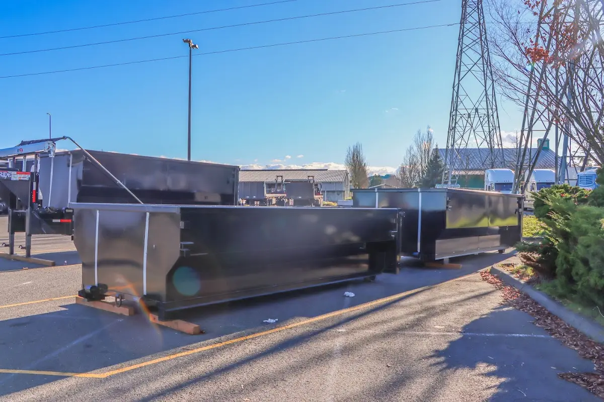Roll-off dumpster ready for waste disposal at job site for Commercial Dumpster Rental in Clayton